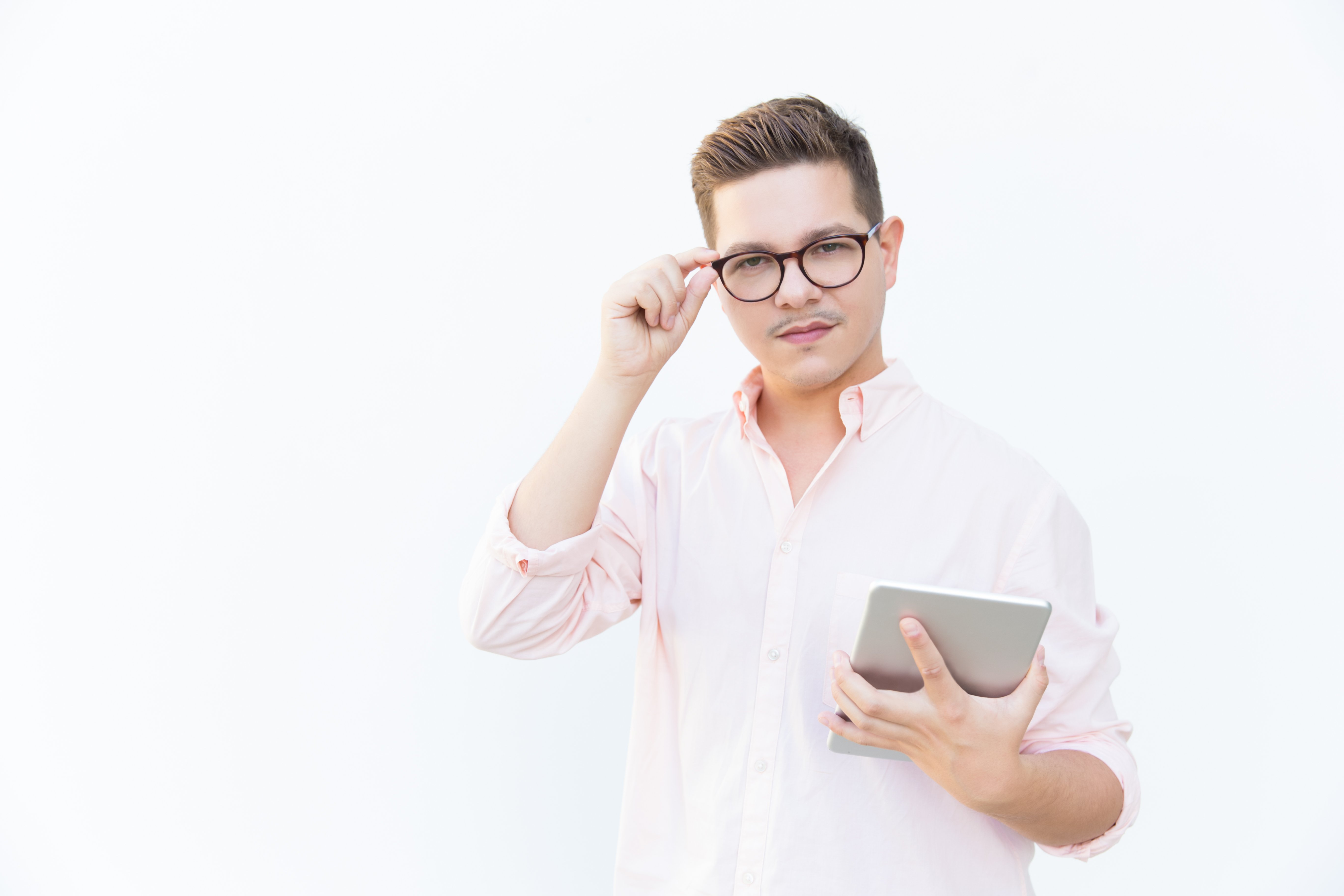Serious App Developer Holding Tablet